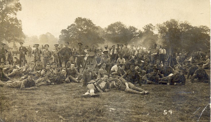 'A' Company, 18th Battalion C.E.F. Addressed to Mr. Paris Anderson, Crediton, Ontario, Canada. The message reads, "Sandling Camp, September 1.4.1915. Tuesday evening 5 p.m. Dear Paris, This will let you know the time we are leaving England. Thiis shows 'A Co' y ' 18th Bn. resting in Hatch Park. Am quite well, hoping you & family are the same.  Yours, Lyle 
