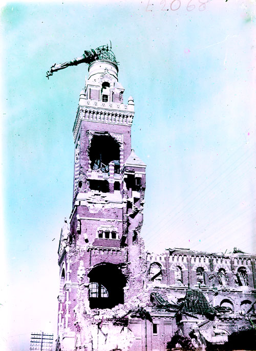 Official Australian photographer Captain Frank Hurley’s colour image of the shell-damaged Albert Basilica taken in September 1917. [AWM P03631_189]