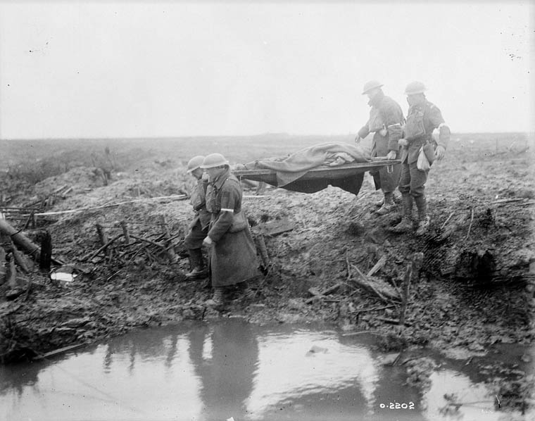 Wounded Canadians on way to aid-post. Battle of Passchendaele. November, 1917.